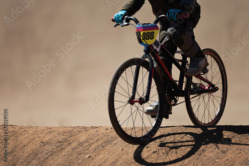 BMX rider competing in the child class on the off-road circuit