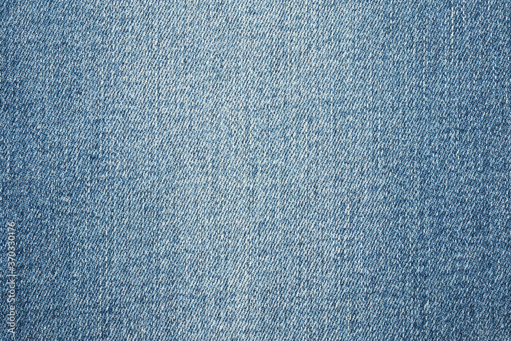 Denim blue jeans texture close up background top view Denim blue jeans texture close up background top view
