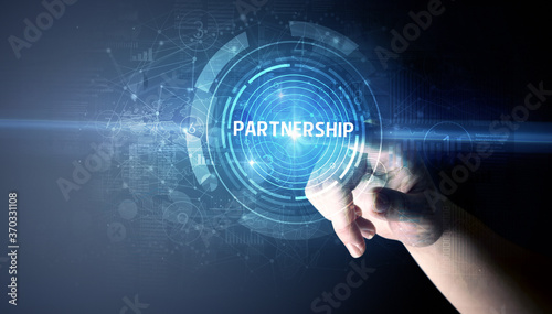 Hand touching PARTNERSHIP button, modern business technology concept