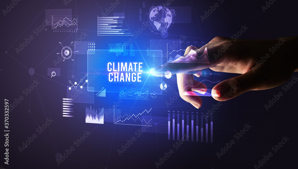 Hand touching CLIMATE CHANGE inscription, new business technology concept Hand touching CLIMATE CHANGE inscription, new business technology concept