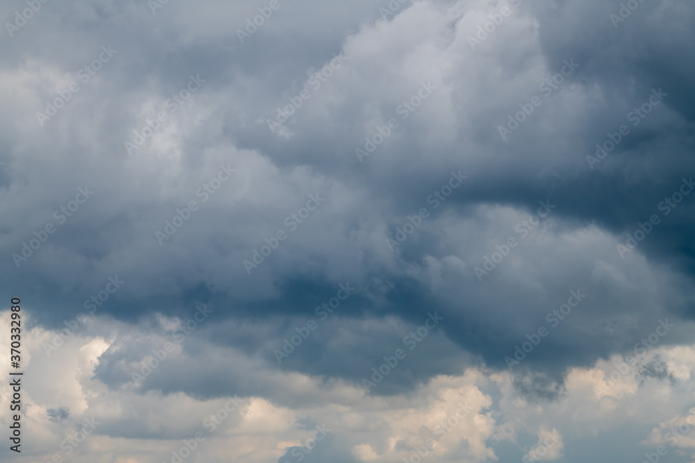 Cloudy gloomy sky, clouds, inclement weather, cumulus clouds.
