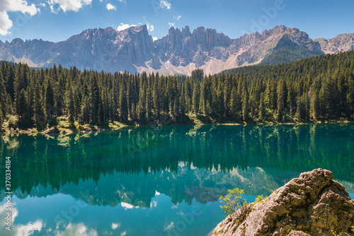 Fototapeta Naklejka Na Ścianę i Meble -  Scenic view of Carezza Lake - Lago di Carezza - Karersee, South Tyrol, Italy.