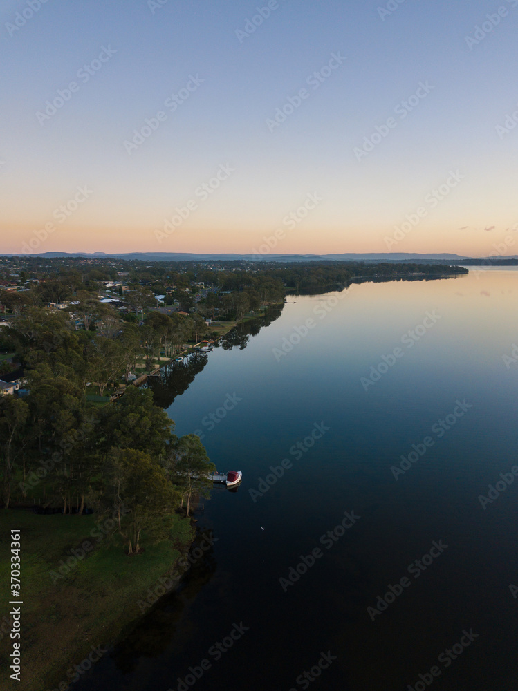 Aerial view along Budgewoi Lake, Central Coast, NSW, Australia.