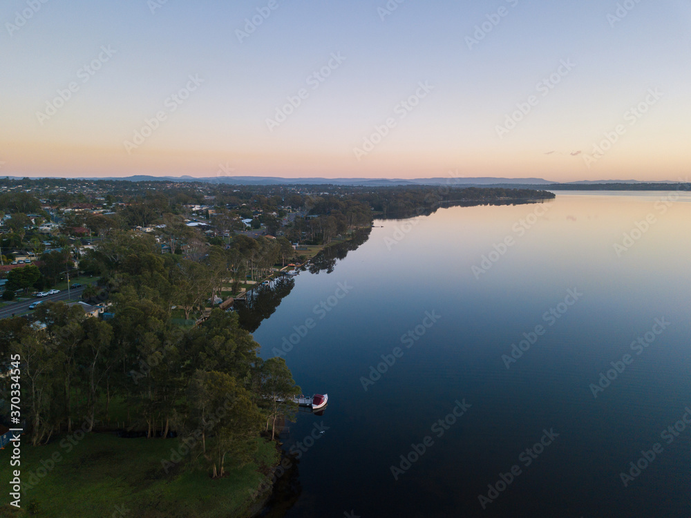 Aerial view along Budgewoi Lake, Central Coast, NSW, Australia.