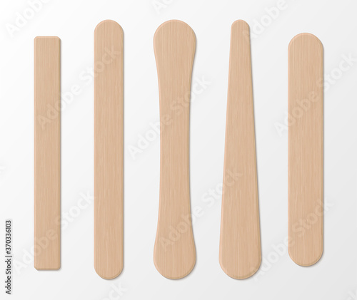 Ice cream sticks of different shapes realistic set. Popsicle, iceblock spatulas. Wooden tongue depressor. photo
