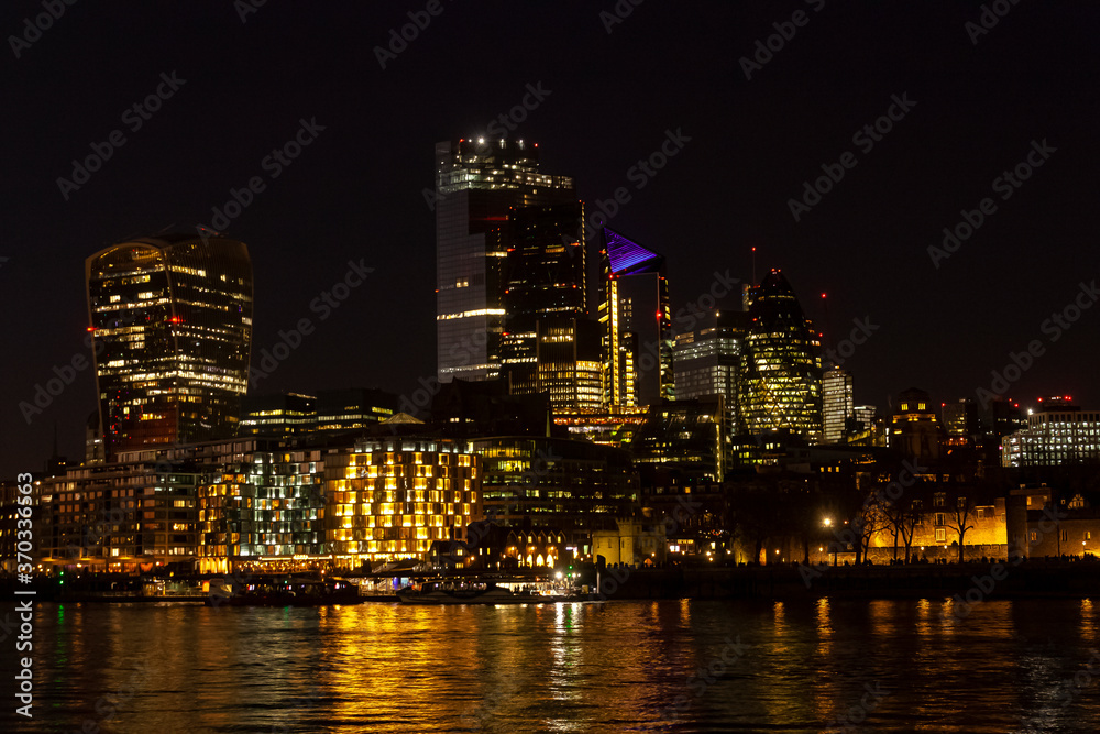 A night time view of the City of London from across the Thames