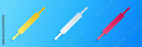 Paper cut Rolling pin icon isolated on blue background. Paper art style. Vector.