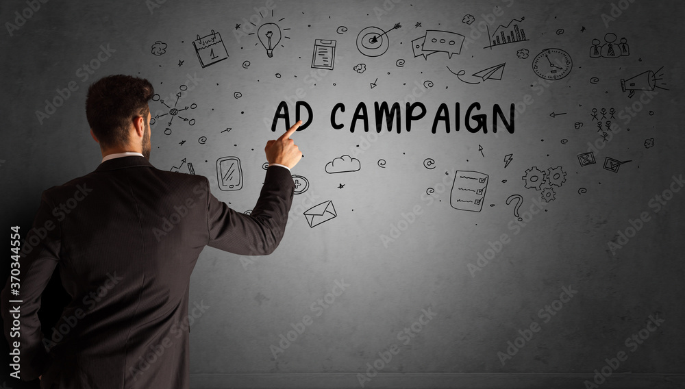businessman drawing a creative idea sketch with AD CAMPAIGN inscription, business strategy concept businessman drawing a creative idea sketch with AD CAMPAIGN inscription, business strategy concept