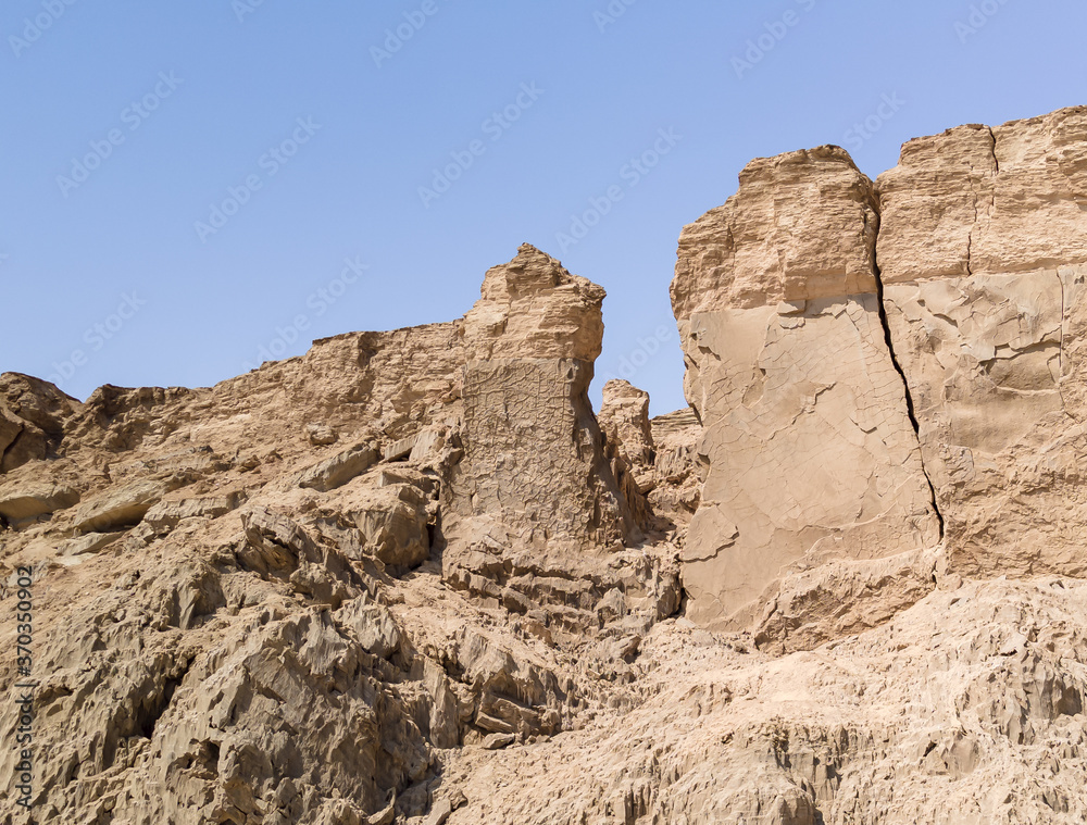 Lots wife - Eshet Lot is a rock salt column on Mount Sodom - Sdom - on coast of Dead Sea in Israel. Reminiscent of shape of a woman dressed in a veil. Traditionally perceived as petrified wife of Lot Lots wife - Eshet Lot is a rock salt column on Mount Sodom - Sdom - on coast of Dead Sea in Israel. Reminiscent of shape of a woman dressed in a veil. Traditionally perceived as petrified wife of Lot
