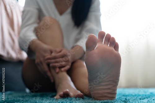 foot ankle injury pain women touch her foot painful, healthcare and medicine concept