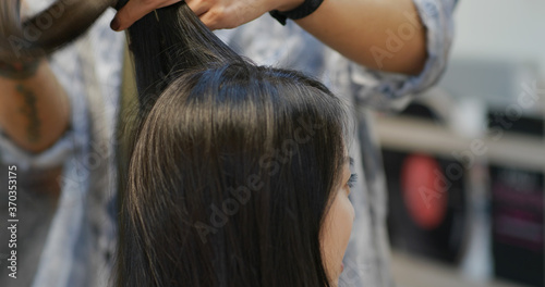 Woman with hair cut in salon