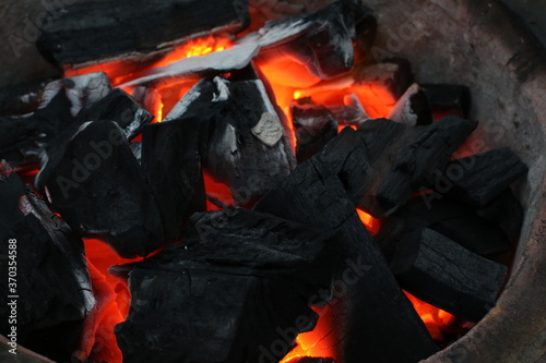 hot coals burning in a fireplace