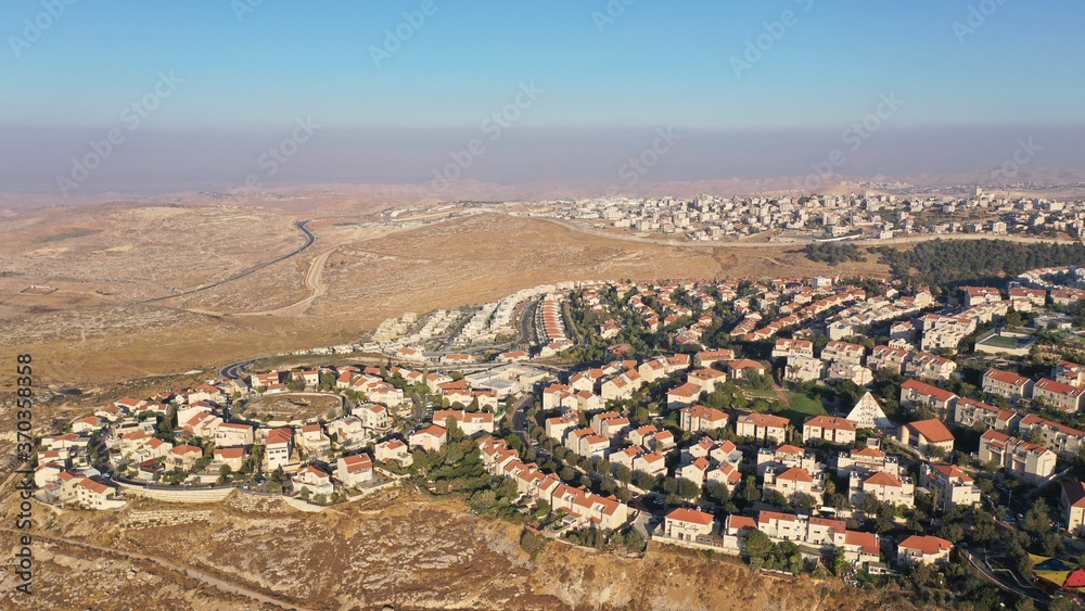 Israel and Palestine town divided by wall, aerial
pisgat zeev and anata refugees camp, Jerusalm israel
