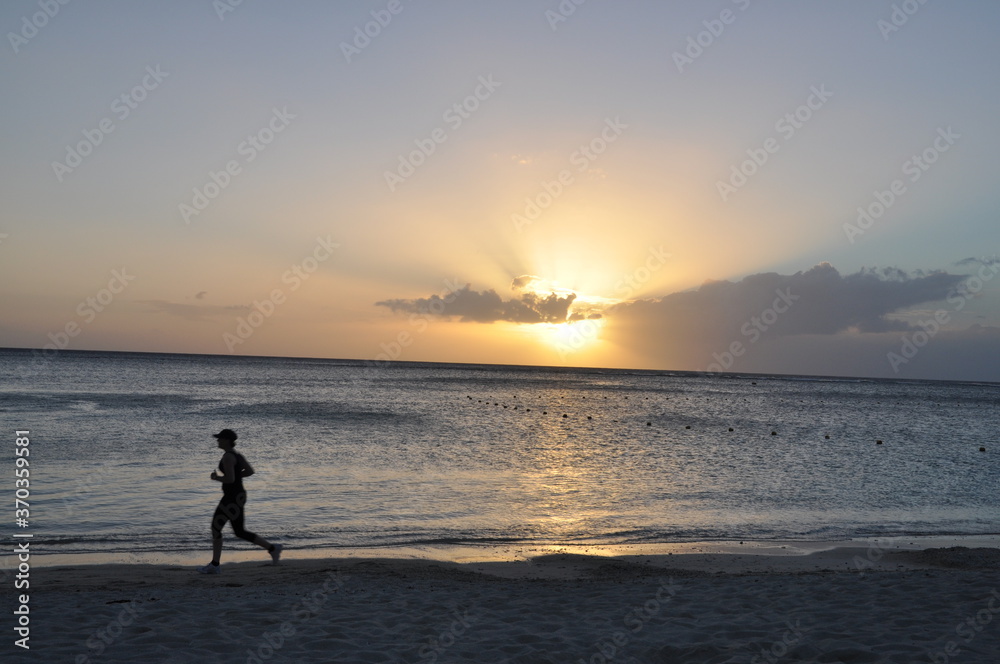 Sunset with runner in Mauritius