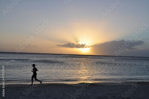 Sunset with runner in Mauritius