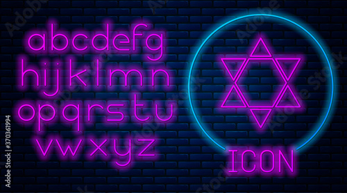 Glowing neon Star of David icon isolated on brick wall background. Jewish religion symbol. Symbol of Israel. Neon light alphabet. Vector Illustration.