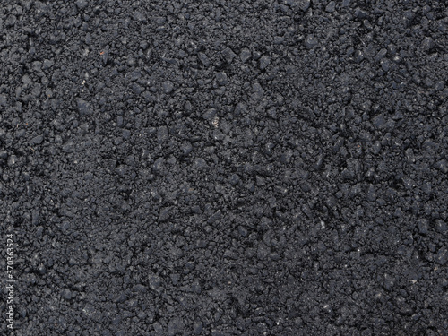 Dark texture of fresh and clean asphalt