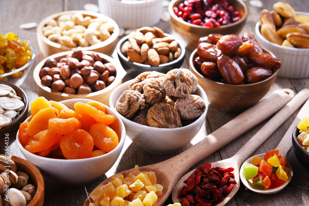 Composition with dried fruits and assorted nuts. Delicacies Composition with dried fruits and assorted nuts. Delicacies