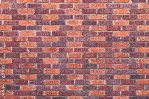 red brown colored textured lined aligned pattern brick wall