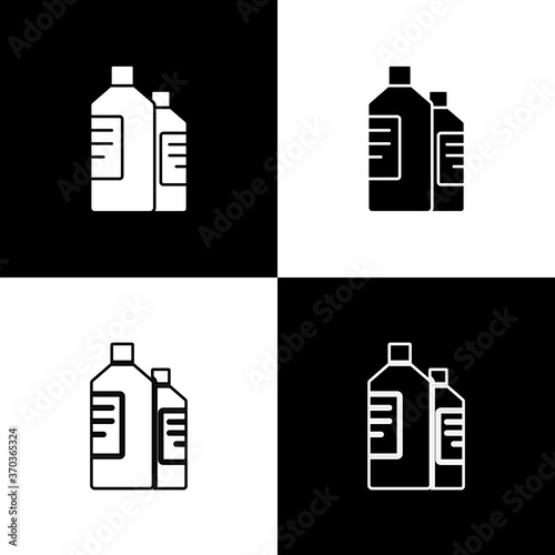 Set Plastic bottles for laundry detergent, bleach, dishwashing liquid or another cleaning agent icon isolated on black and white background. Vector Illustration.