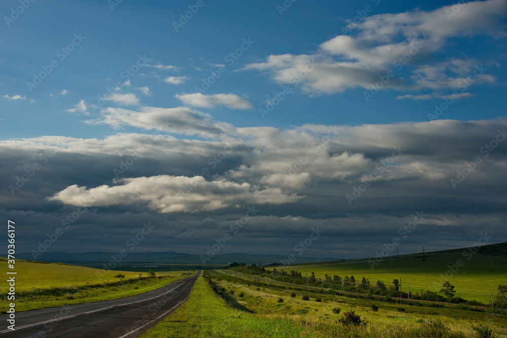 Obraz premium Russia. Republic Of Khakasia. Endless steppes among picturesque hilly mountains near the village of Shira.