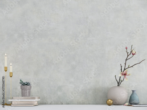 Modern room decoration. Flower pots, candle holder and books on white table with white wall background. 