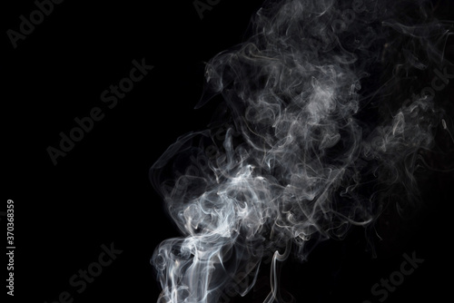 white smoke on black background