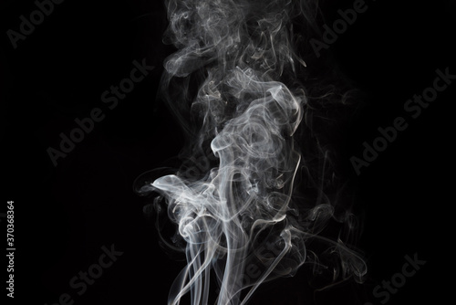 white smoke on black background