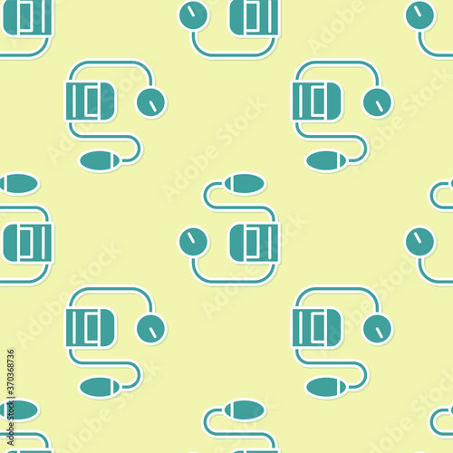 Green Blood pressure icon isolated seamless pattern on yellow background. Vector Illustration.