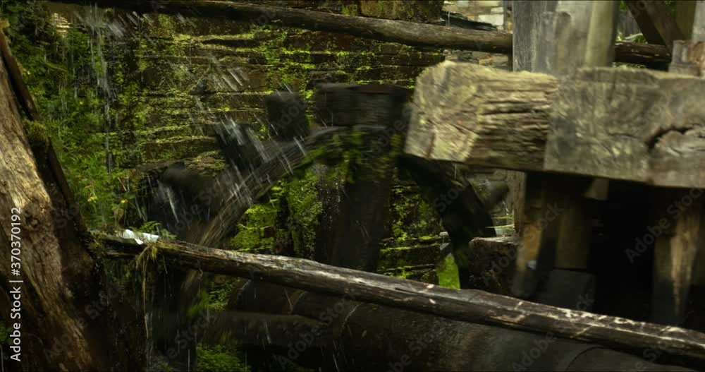 Water mill for grinding cereal in the ethnographic complex Os Teixois in Taramundi, Asturias Spain Water mill for grinding cereal in the ethnographic complex Os Teixois in Taramundi, Asturias Spain