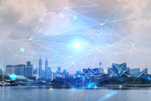Photography Abstract technology icons hologram over panorama city view of Kuala Lumpur, Malaysia, Asia