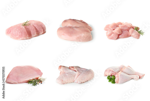 Set with raw chicken meat on white background