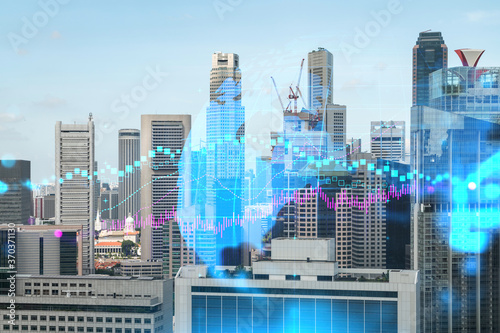 Forex and stock market chart hologram over panorama city view of Singapore, the financial center in Asia. The concept of international trading. Double exposure.