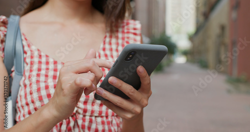 Photography Woman hold with cellphone in city