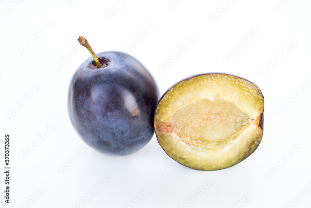 Isolated plums, blue plum fruit isolated on white background Isolated plums, blue plum fruit isolated on white background