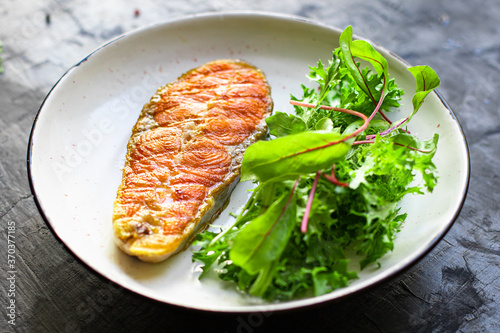 fried salmon steak piece of fillet fish seafood natural product ingredient second course organic eating healthy top view place for text copy space keto or paleo diet raw pescetarian