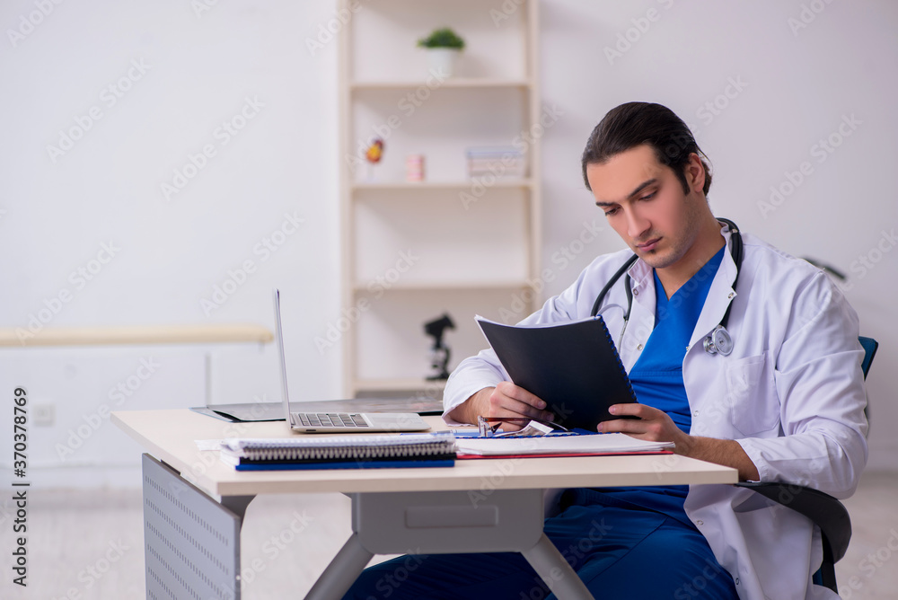 Young doctor working in the hospital Young doctor working in the hospital