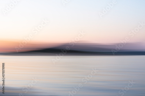 Abstract view of Ireland s Eye Island - where day meets night  painting with light