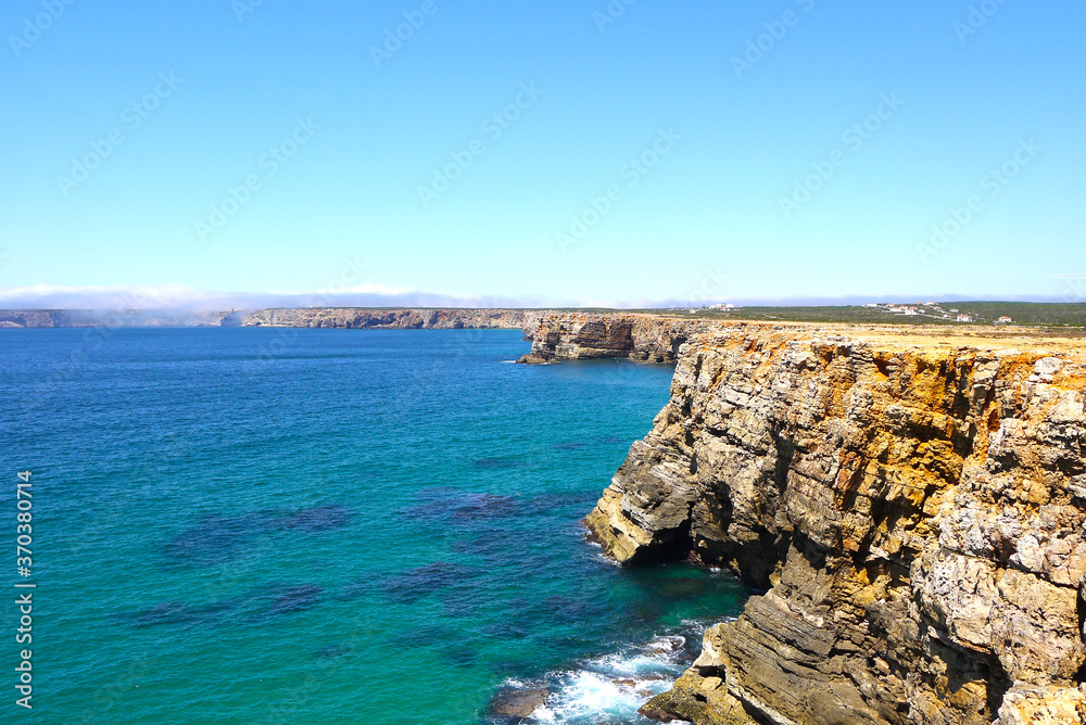 Fototapeta premium Landscape of coves in Conil de la Frontera, from top, with turquoise blue water, Cadiz, Andalucia, Spain