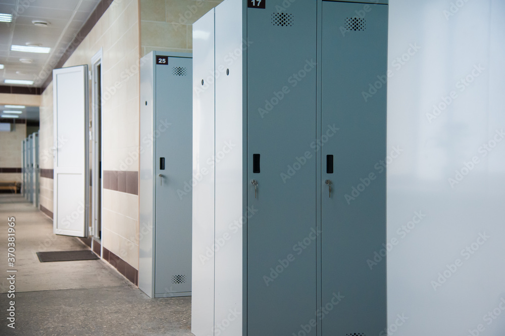 An empty locker room in the sports club, school, section An empty locker room in the sports club, school, section