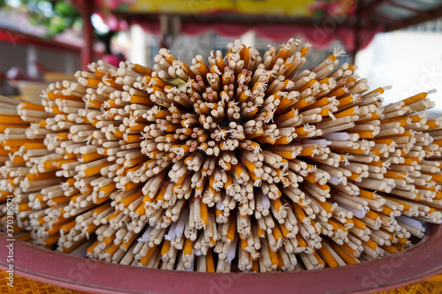 Incense and candles are the beliefs of Buddhism.