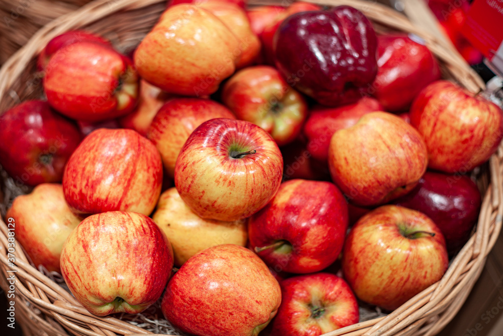 Basket of red ripe apples. Organic natural apples in wooden basket. Basket of red ripe apples. Organic natural apples in wooden basket.