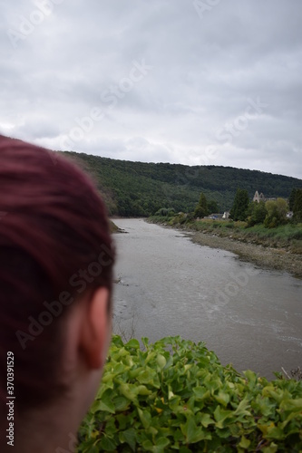 Blurred Girl Looking out across a River