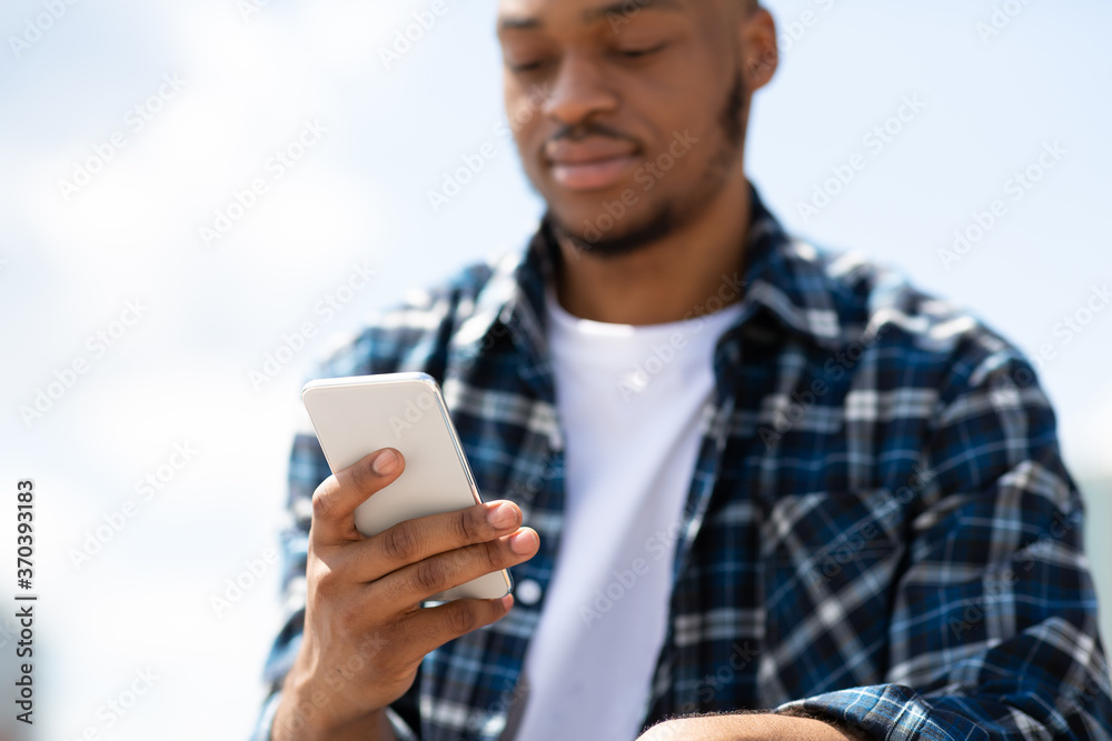 Portrait of afro person scrolling social media Portrait of afro person scrolling social media