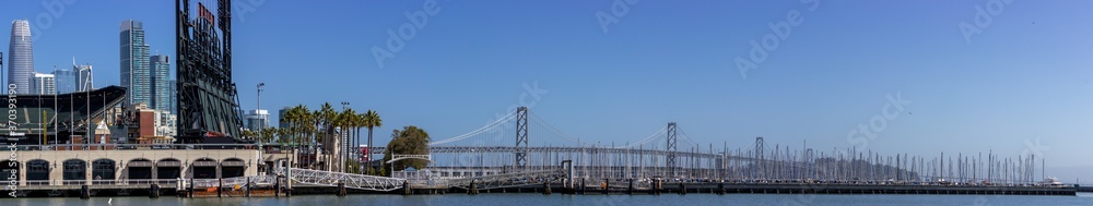 Boats and view of San Francisco skyline and Bay Bridge at South Beach Harbor Marina