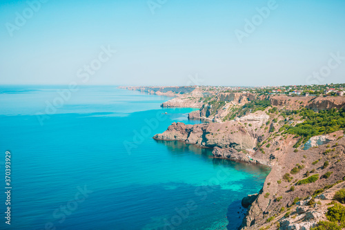 Beautiful seascape. Amazing composition of nature with mountains and cliffs. © travnikovstudio