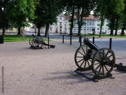 Two ancient canons standing in a park in Vänersborg, Sweden. They are fire canons used to alert if a fire broke out in the city. 