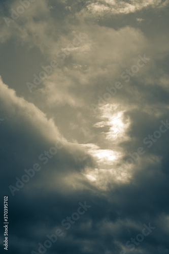 A cloudscape view in a monochrome split view photograph