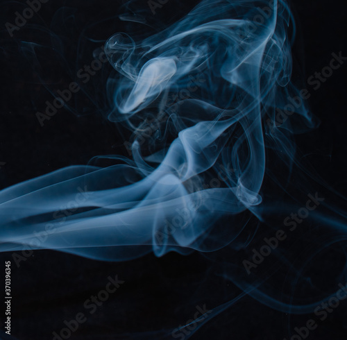 Bluish smoke on black background