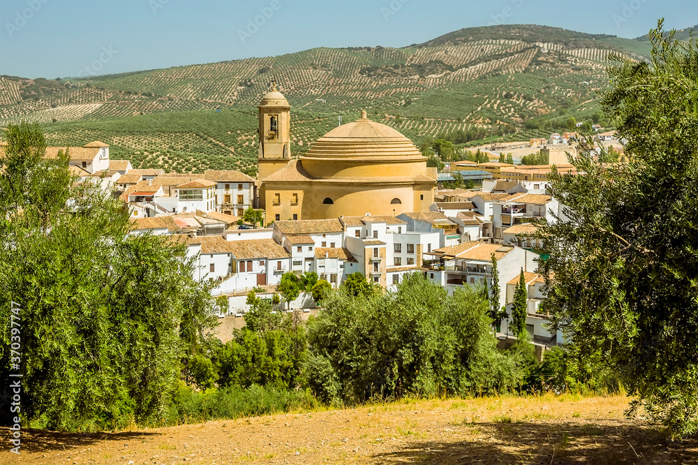 A view of the church and town of Montefrio, Spain in the summertime
